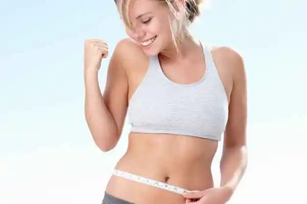 woman happy after fat reduction treatment New Malden